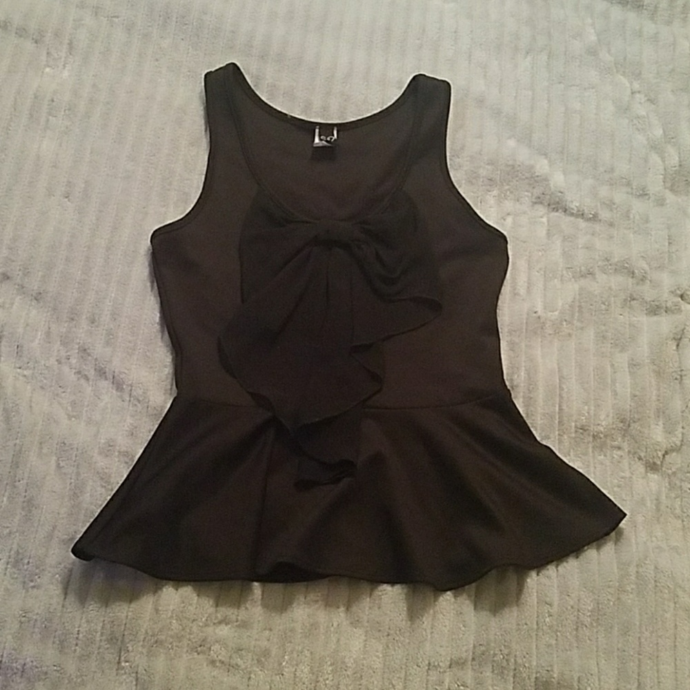 Peplum top with bow